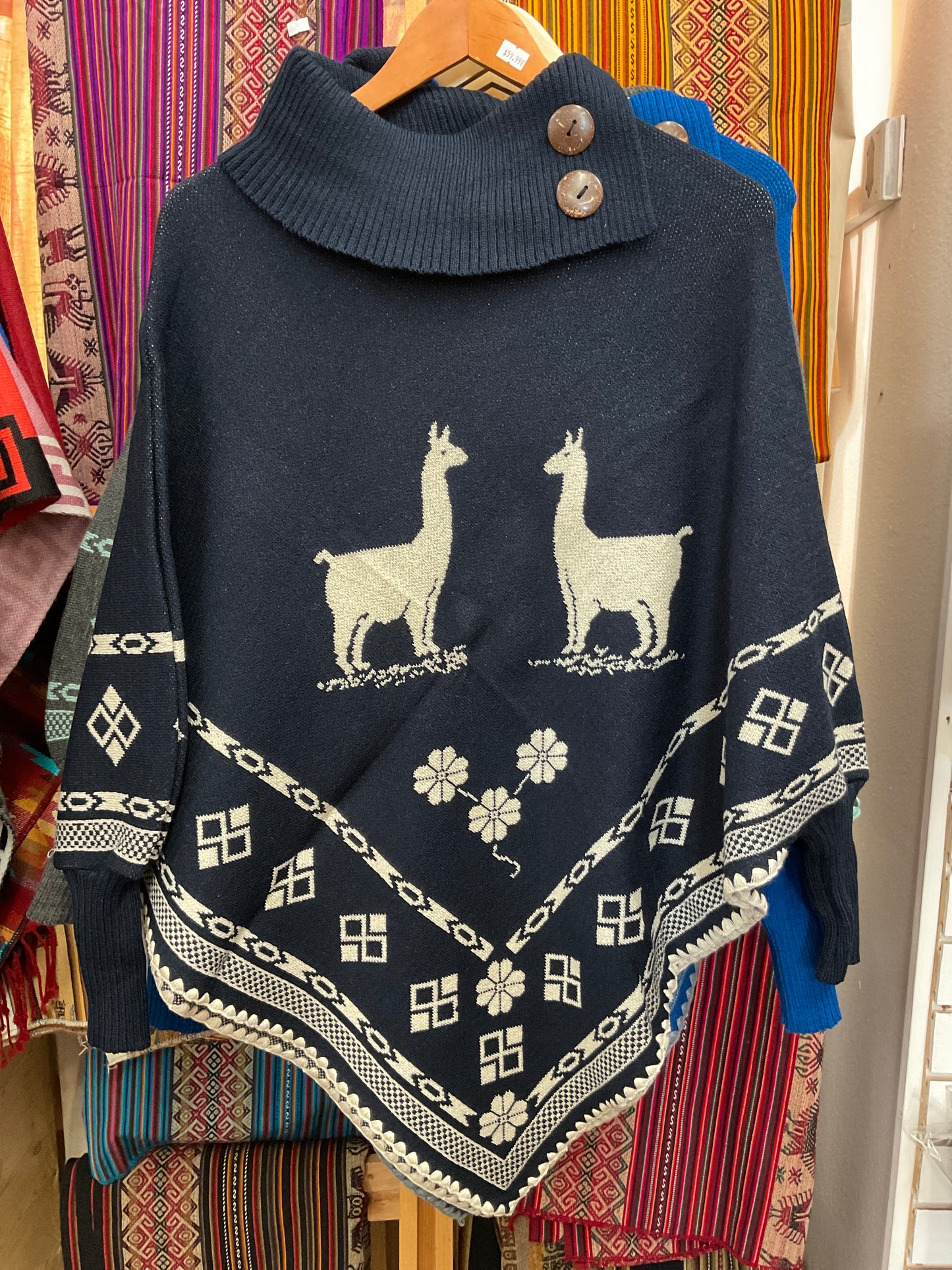 Poncho con mangas para mujer