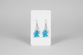 Bonitos pendientes con figuras de cristal de color aguamarina