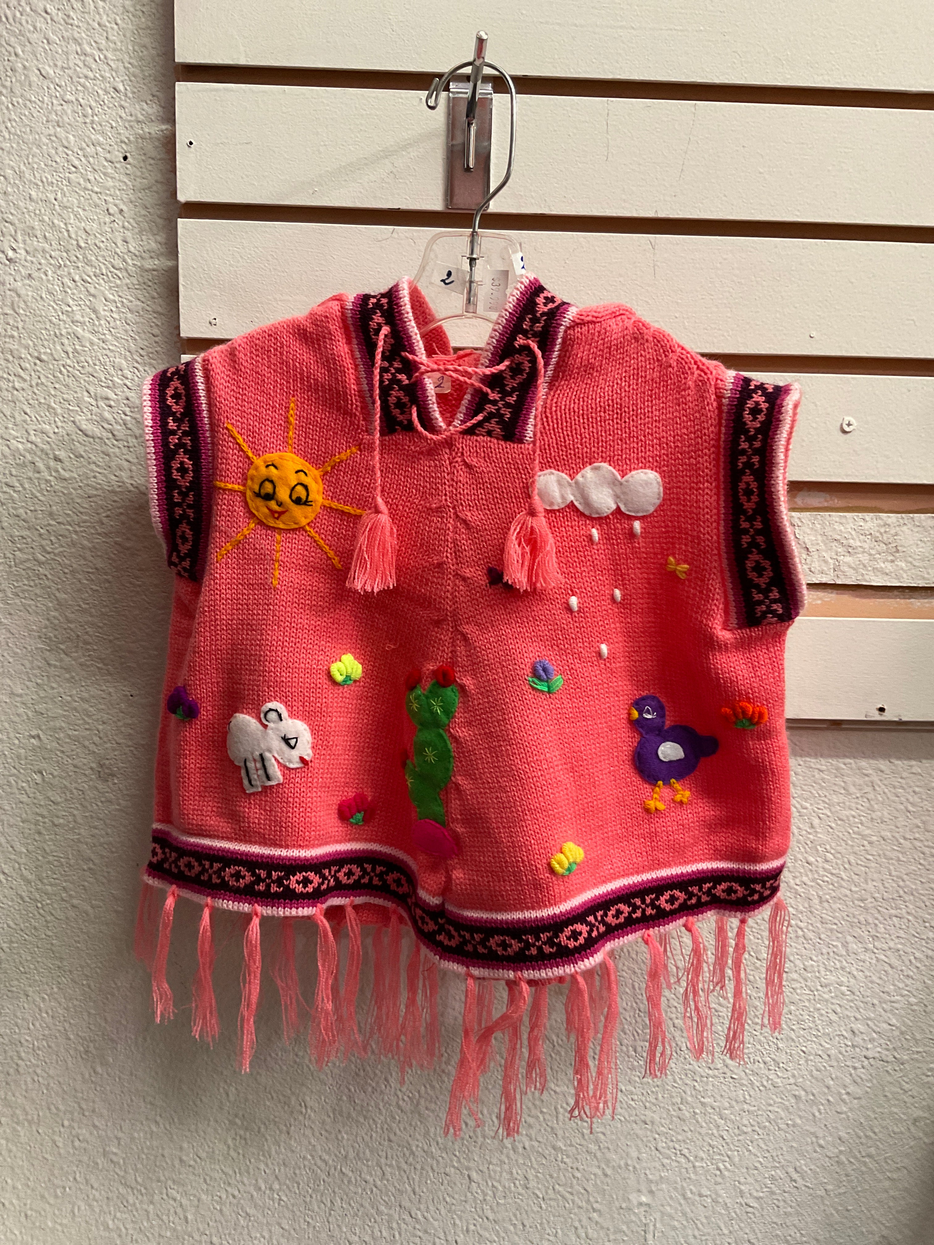 Chaleco tipo poncho para niños