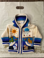 Suéter tipo cárdigan tejido a mano para niños