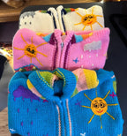 Suéter tipo cárdigan tejido a mano para niños