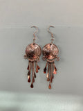 Aretes de moneda peruana