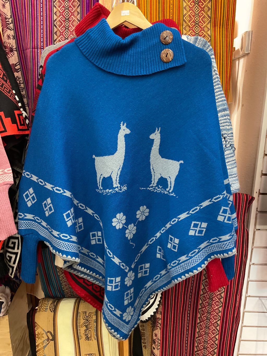 Poncho con mangas para mujer