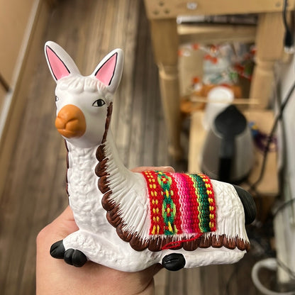 Llama de cerámica