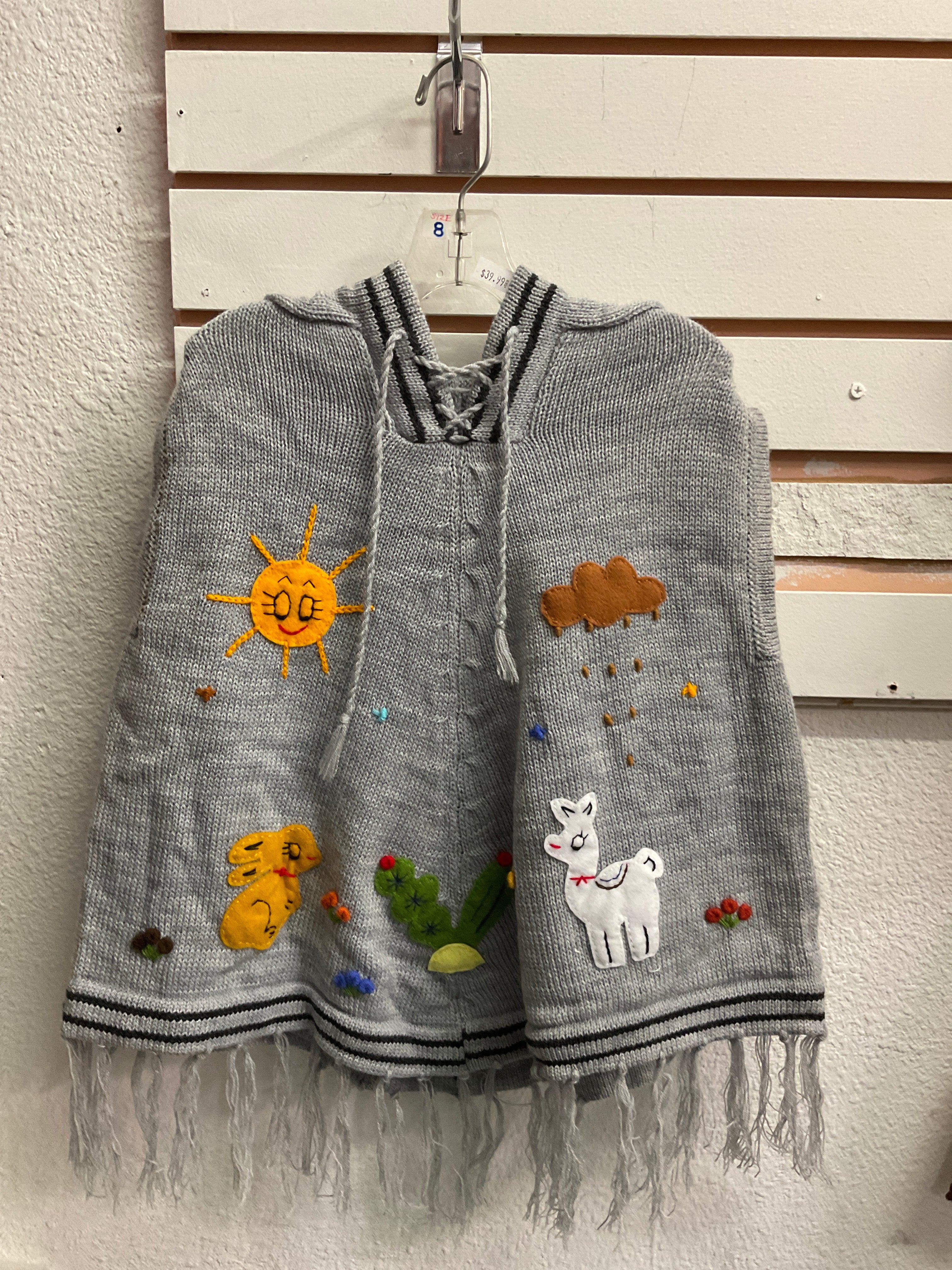 Chaleco tipo poncho para niños