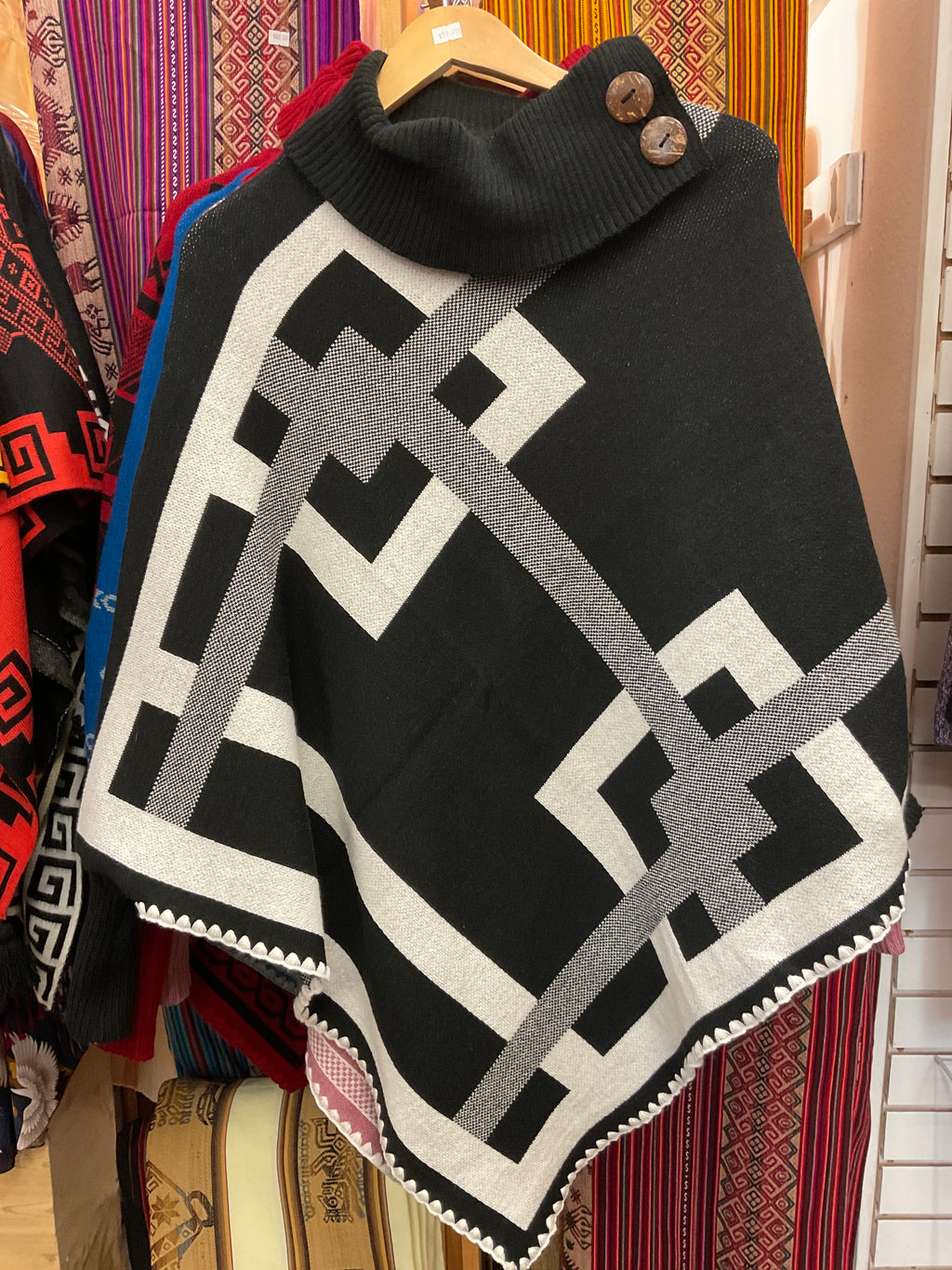 Poncho con mangas para mujer