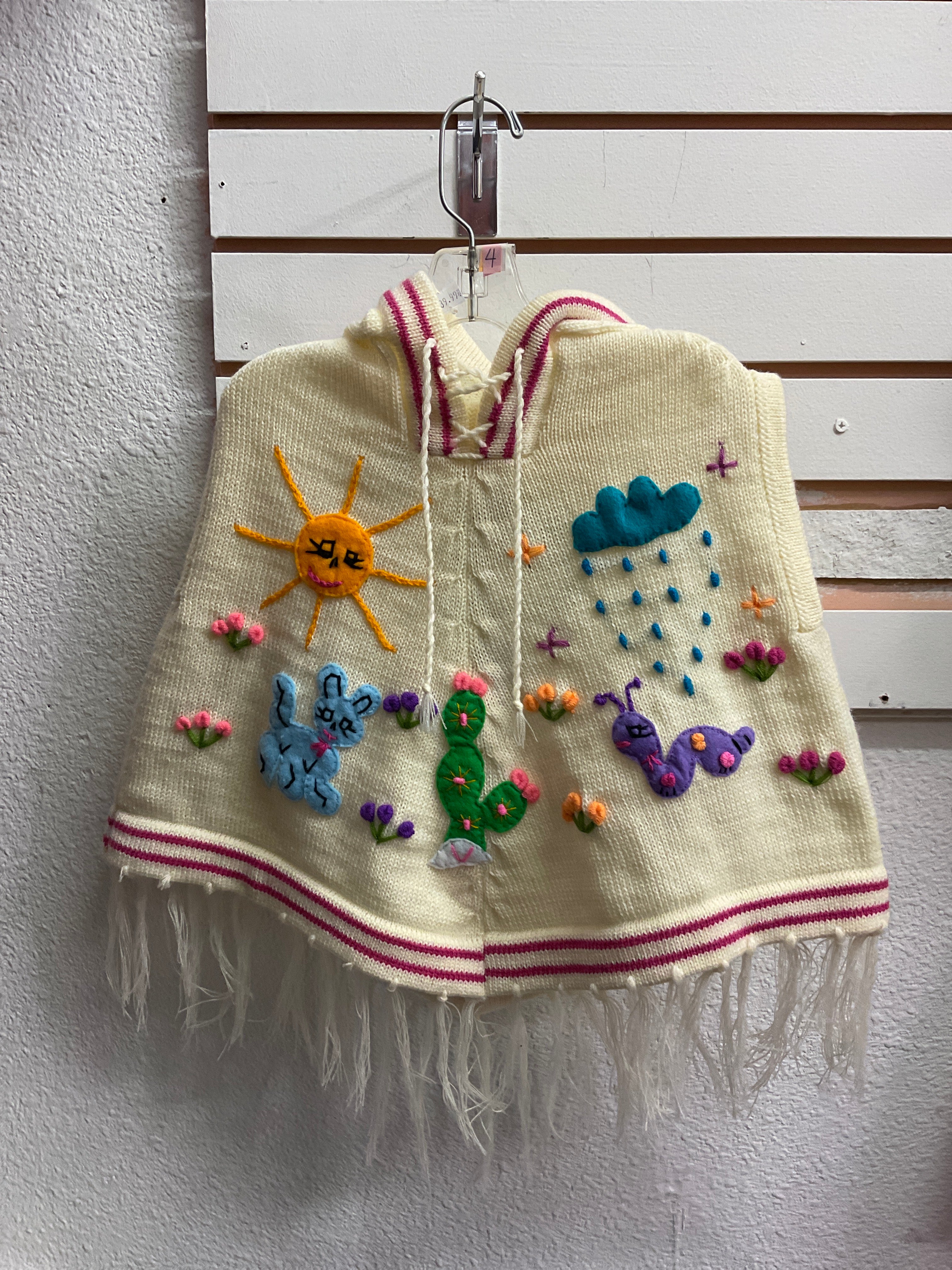 Chaleco tipo poncho para niños