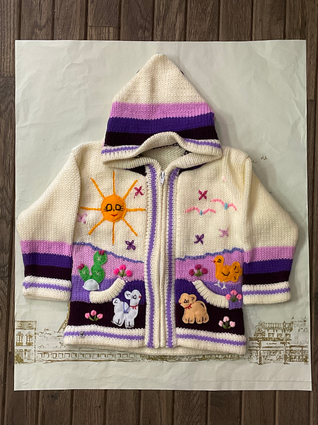 Suéter tipo cárdigan tejido a mano para niños