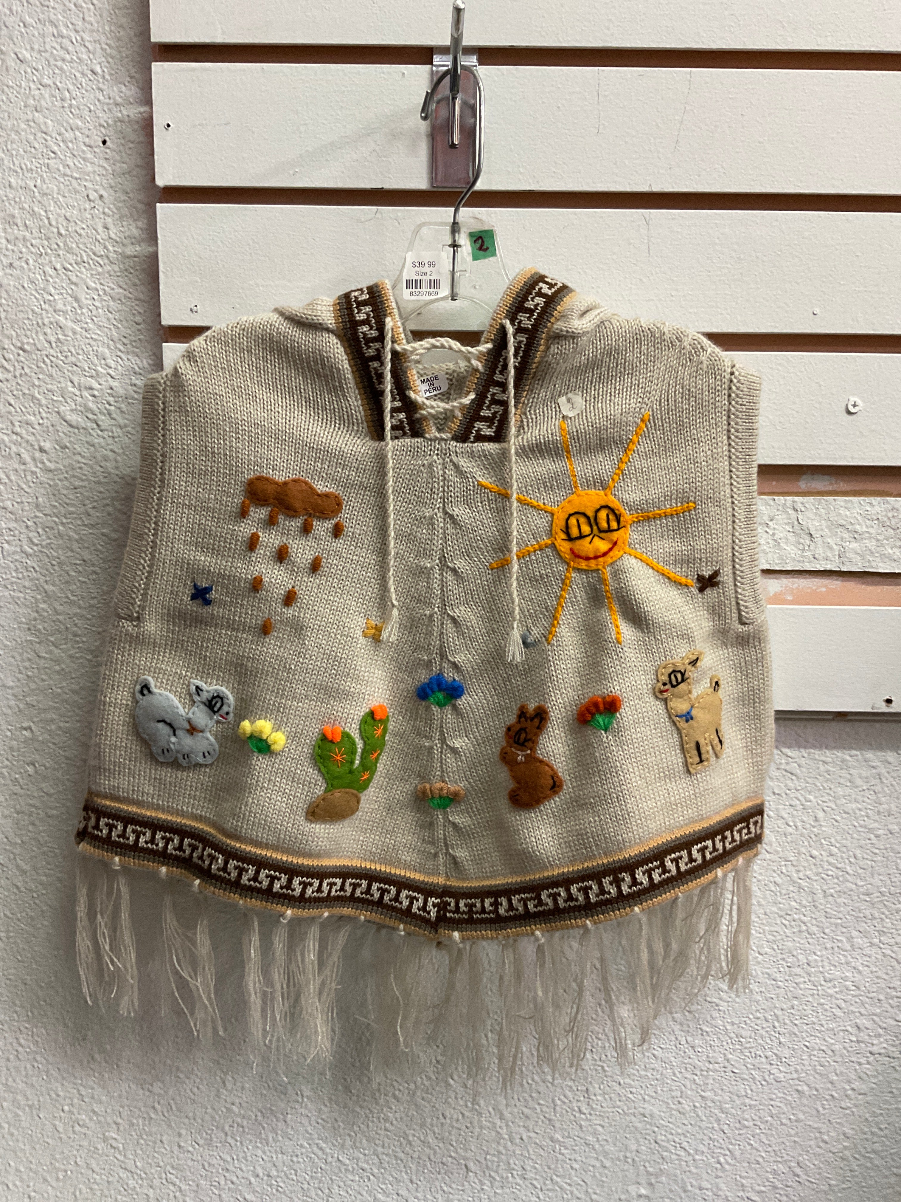 Chaleco tipo poncho para niños