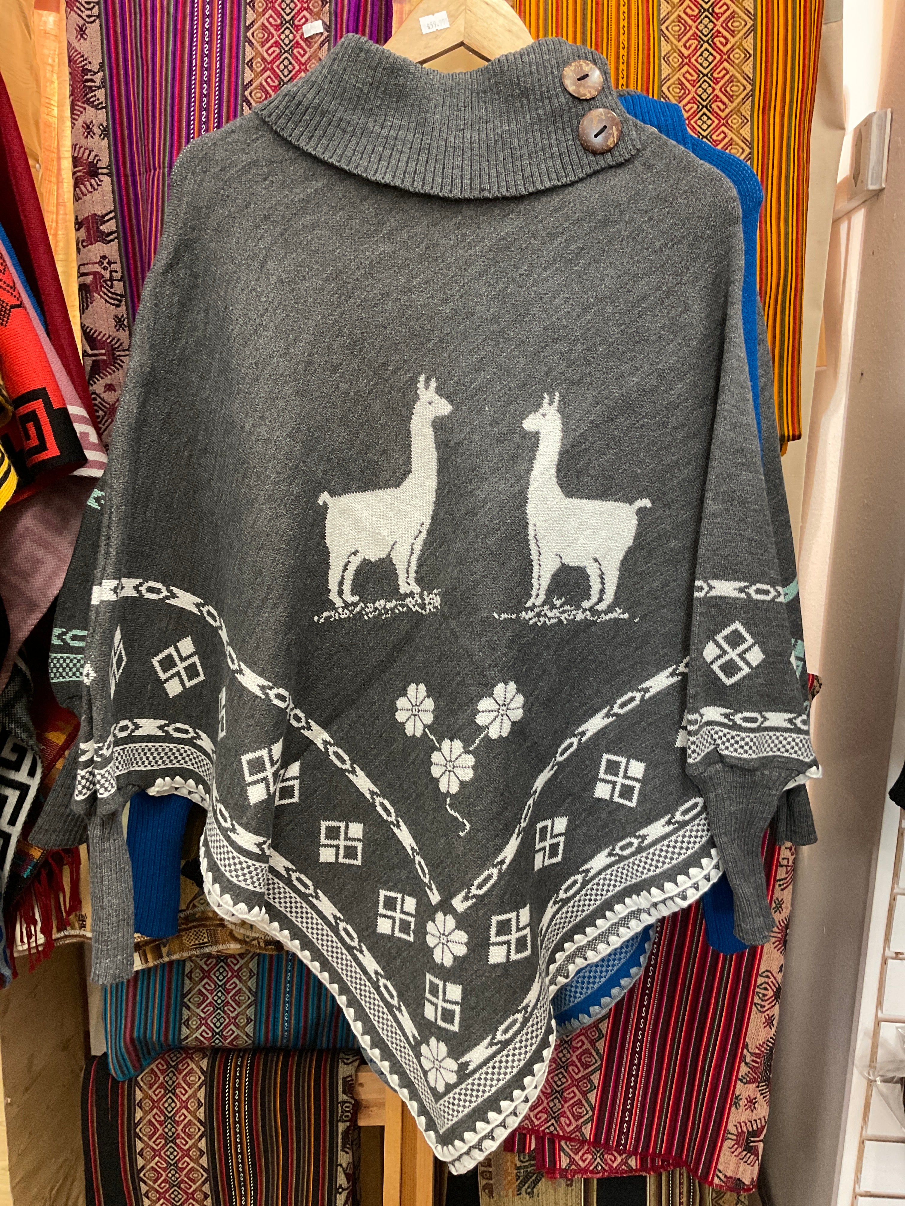 Poncho con mangas para mujer