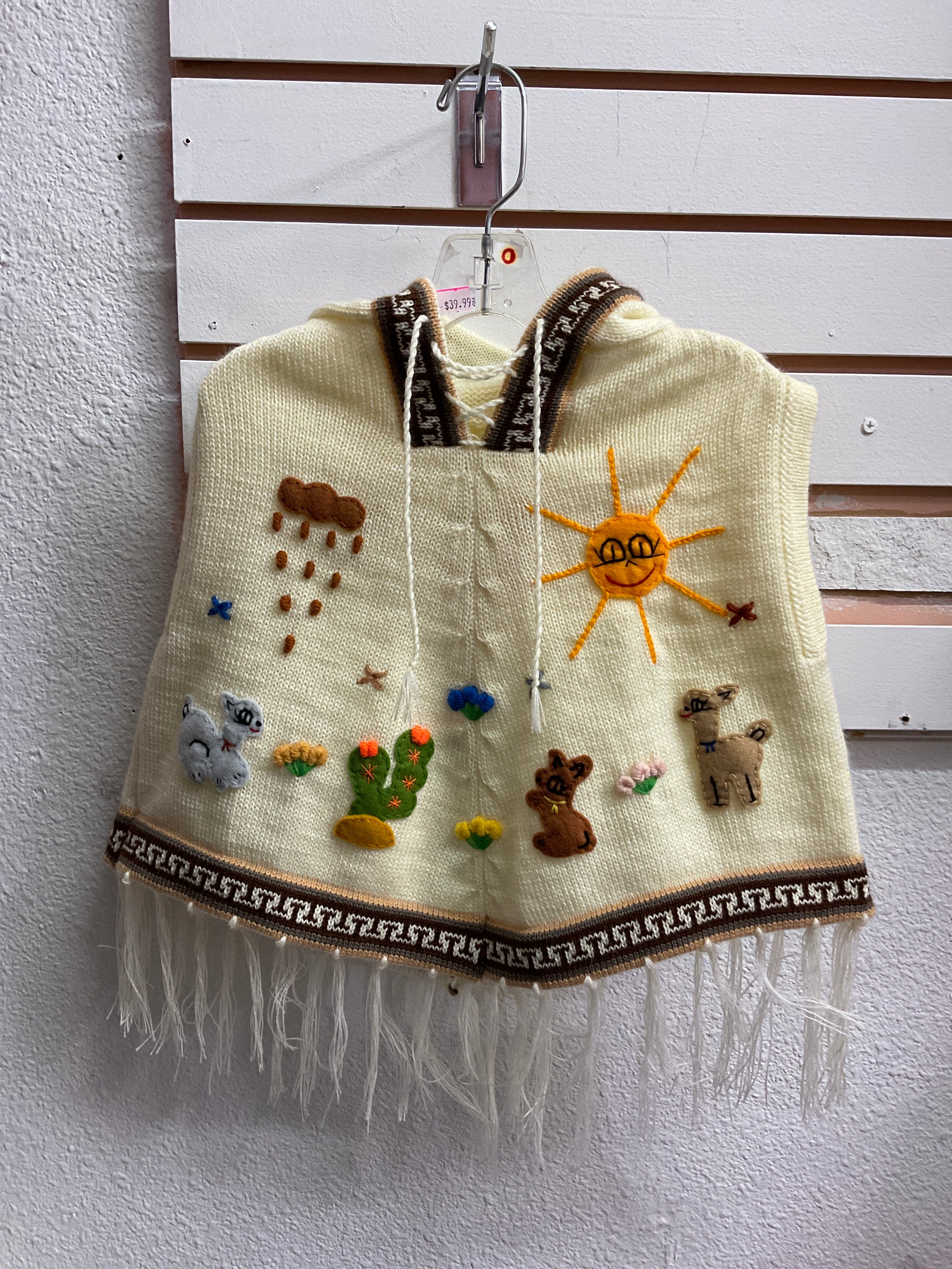 Chaleco tipo poncho para niños