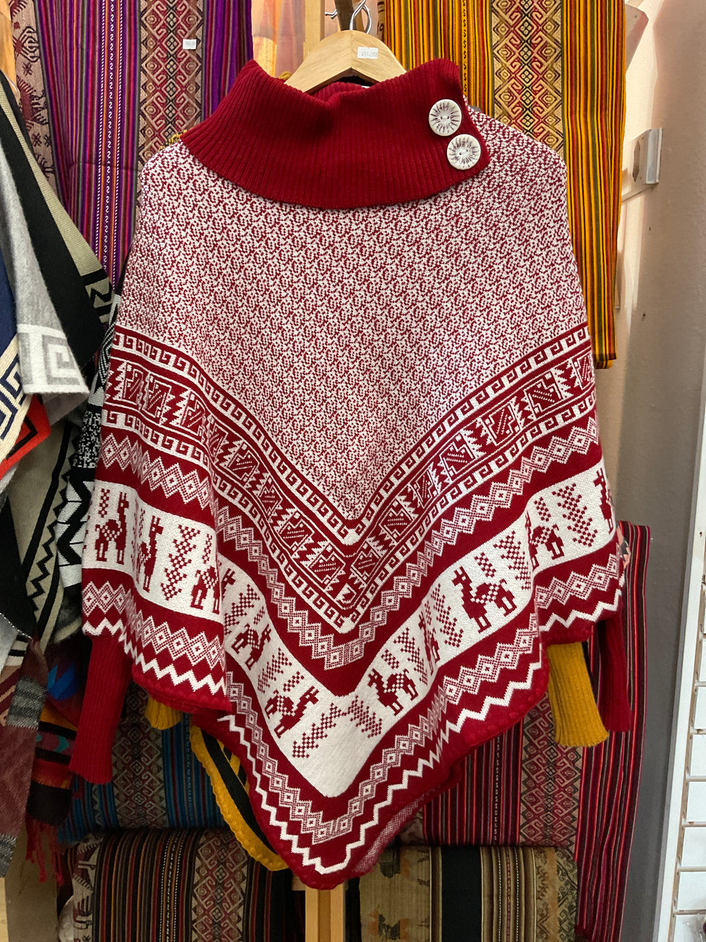 Poncho con mangas para mujer