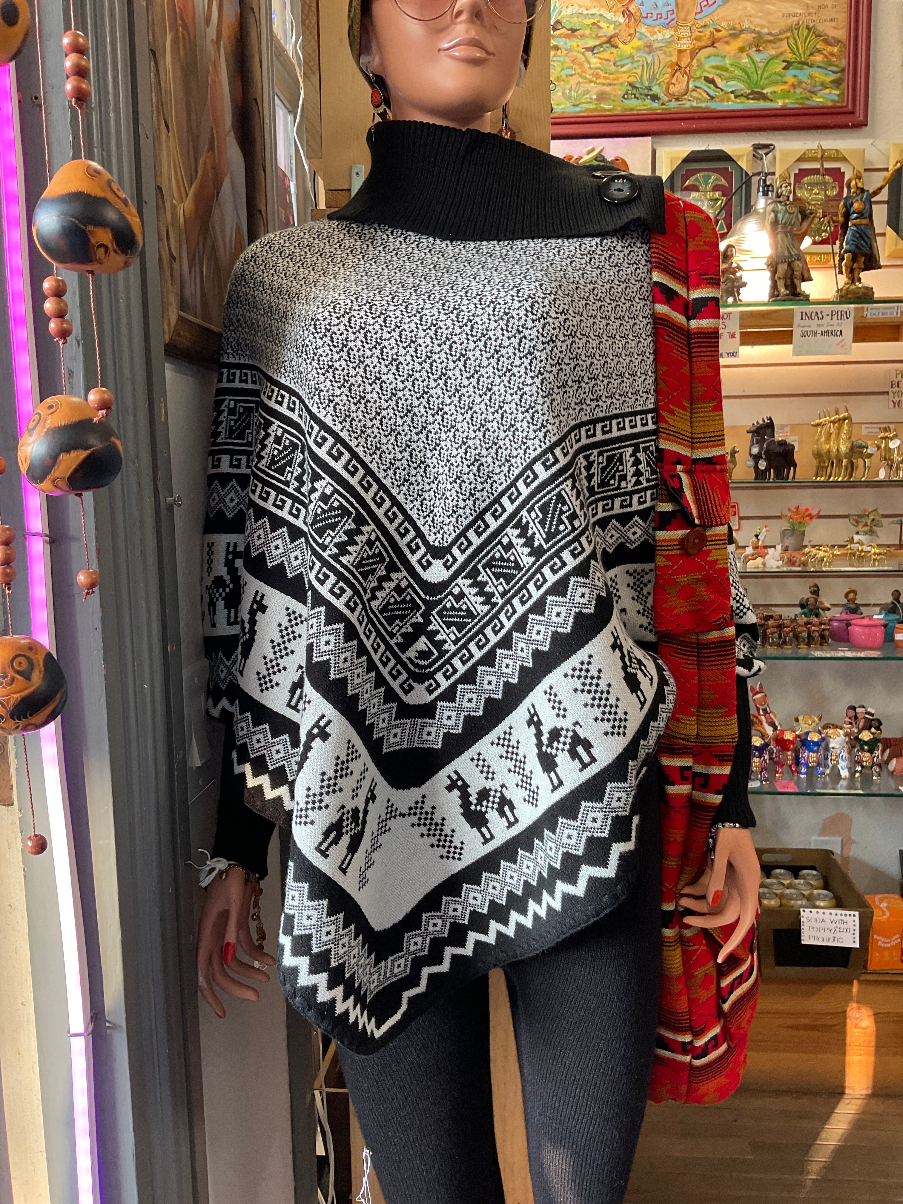 Poncho con mangas para mujer