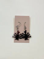Aretes de cuerno con diseño Nazca