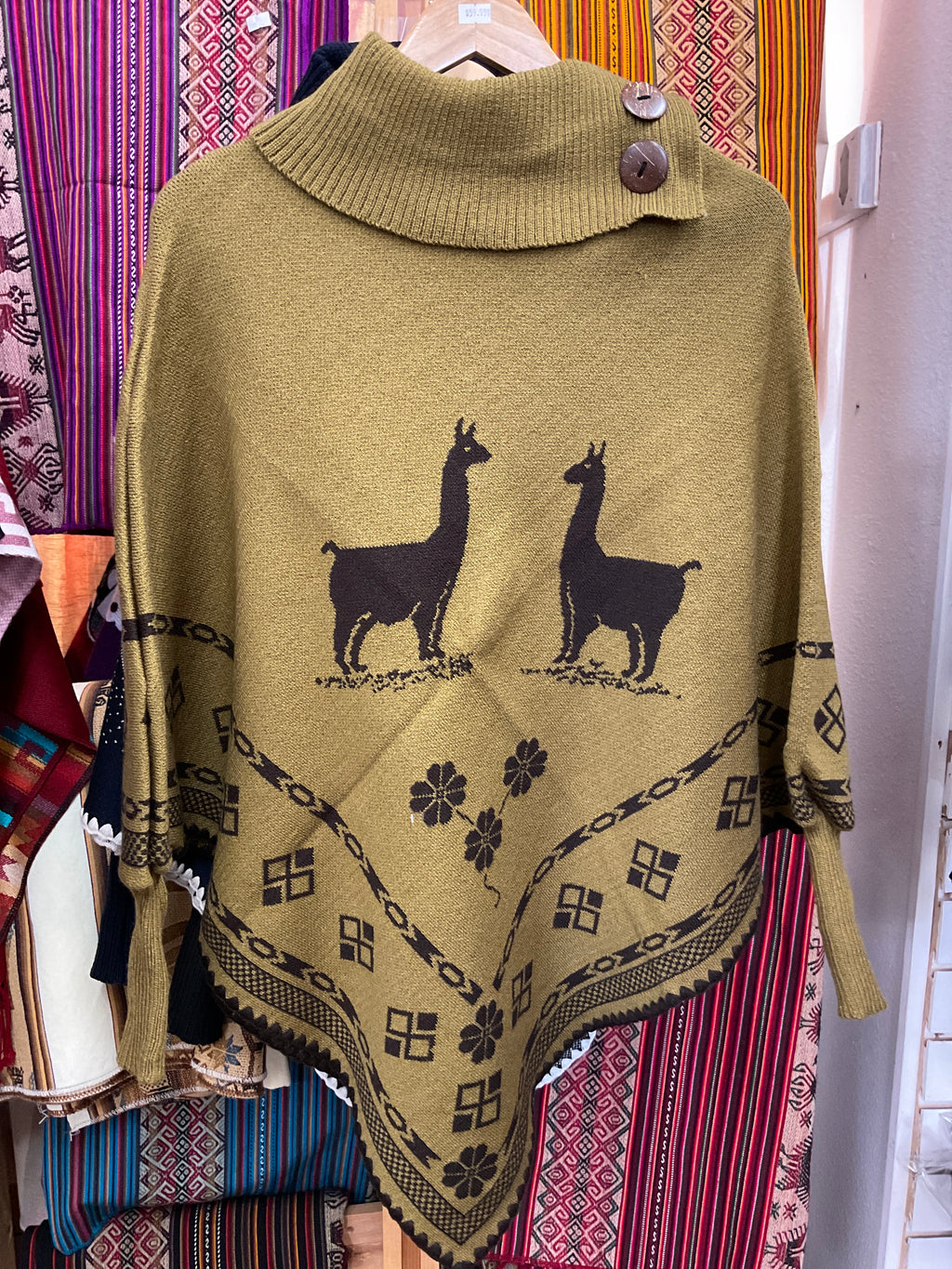 Poncho con mangas para mujer