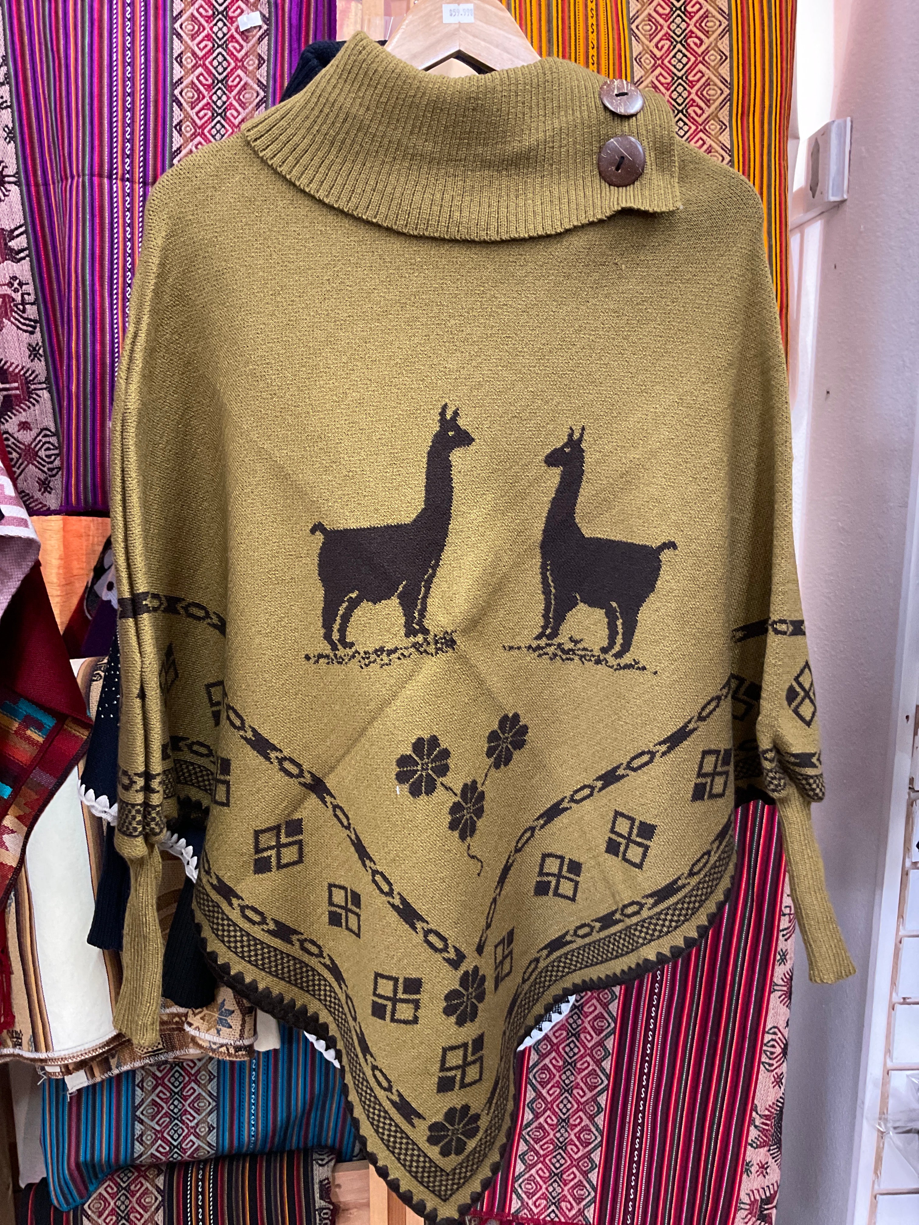 Poncho con mangas para mujer