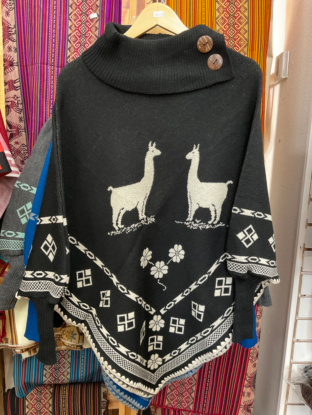 Poncho con mangas para mujer