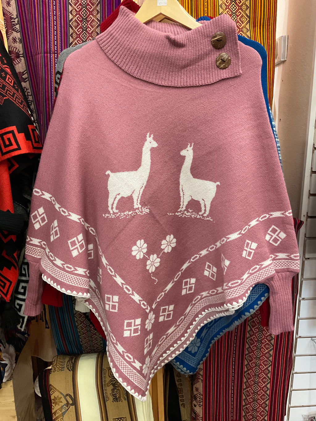 Poncho con mangas para mujer