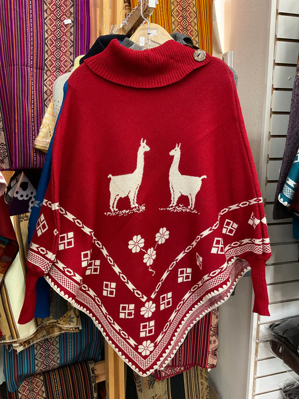 Poncho con mangas para mujer